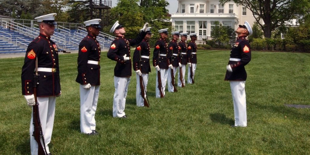 marine drill team in blue dress code