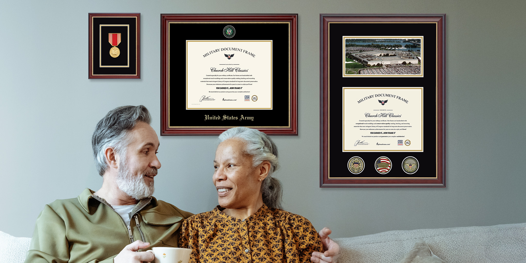 retired veretan sitting on couch with spouse in front of wall of custom military frames and awards